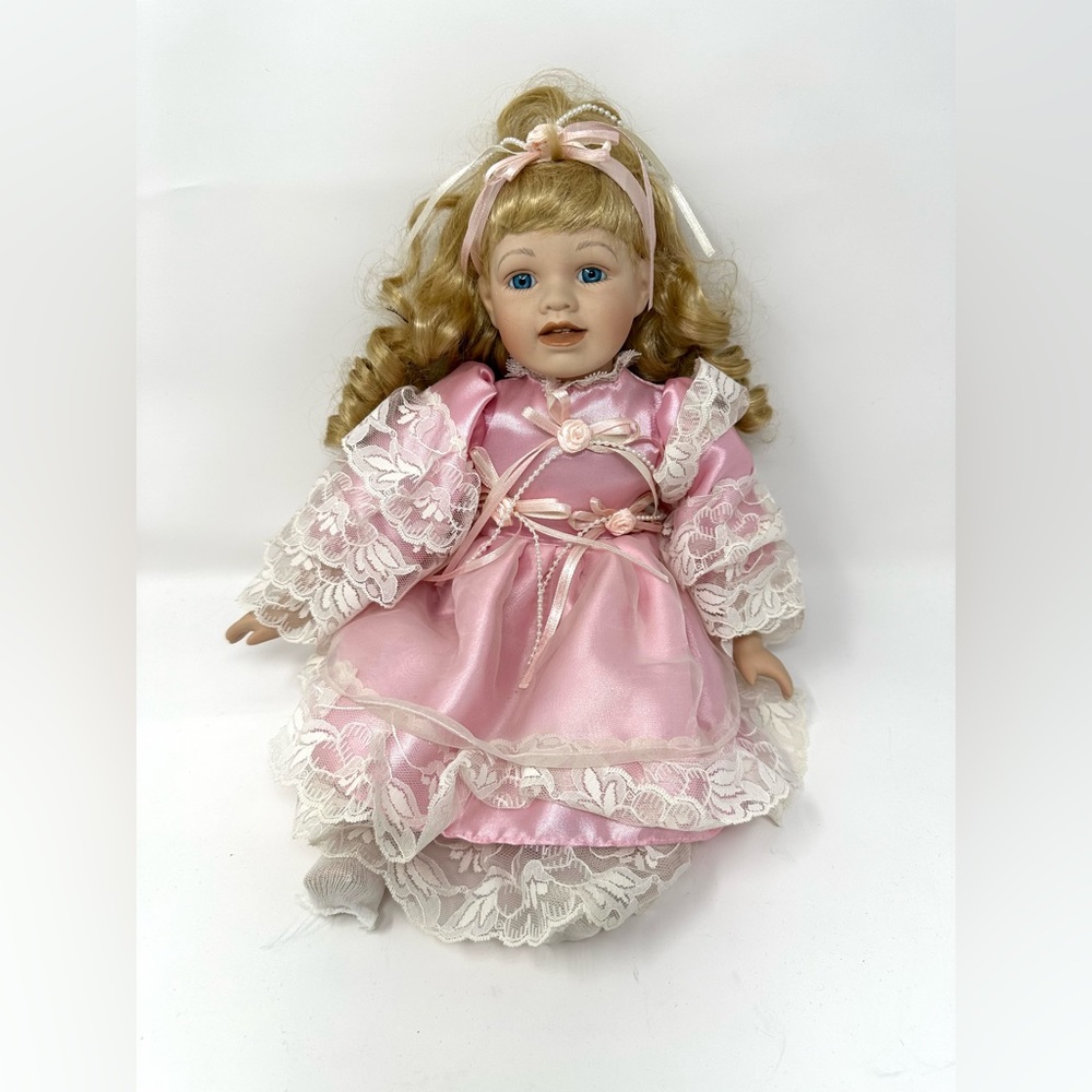 Antique Vintage Collectible Porcelain Doll With Beautiful pink Ruffled Dress